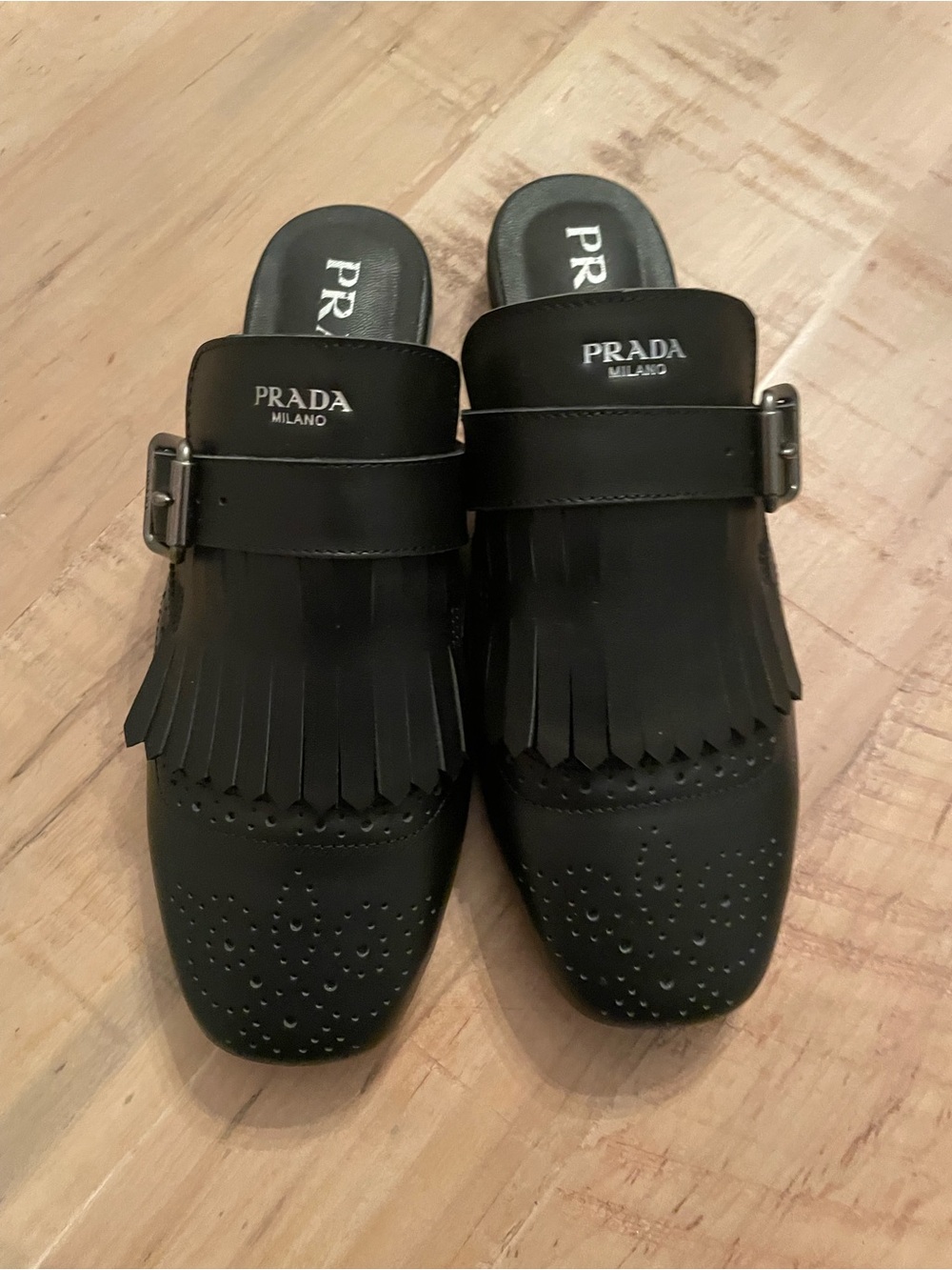 Prada Black Leather Fringe Buckle Mules